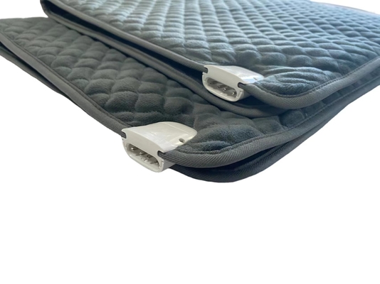 Soulagement ciblé des douleurs musculaires et des zones tendues avec une couverture chauffée électrique pliable
