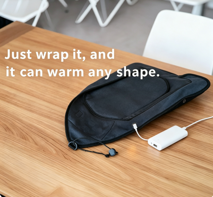 Sac de chauffage alimentaire alimenté par USB avec conception d'emballage flexible et matériaux de qualité alimentaire fournissant un chauffage doux et constant pour les repas emballés